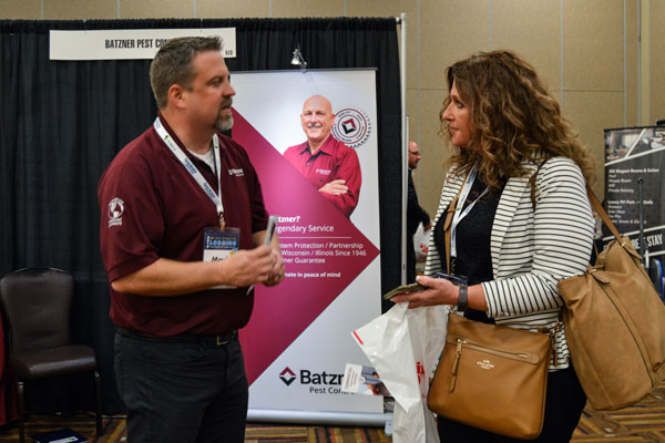 Two people networking at Trade Show