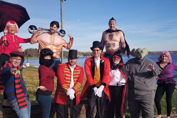 Dave Sekeres and team dressed in costumes at Lake Lawn Resort