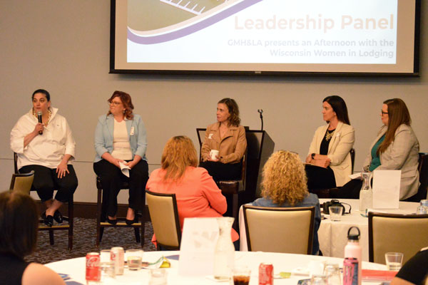 A group of accomplished female leaders, including Amy Supple, Senior VP and Chief Operating Officer at The Edgewater Madison, Maureen Martin, VP of Partnership and Community Engagement at Destination Madison, Heather Stetzer, Director of Development at Downtown Madison Inc., and Jen Yakimicki Guimond, VP of Commercial Strategy for NCG Hospitality