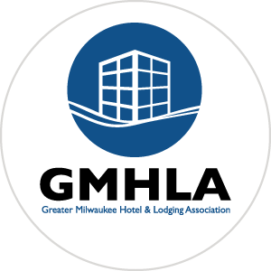 Greater Milwaukee Hotel & Lodging Association logo. Blue and Black. Circle outline of a four story building with lots of windows next to GMHLA initials.