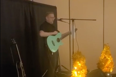 Stevens Point Hotelier and Musician Performs “Ode to WHLA”